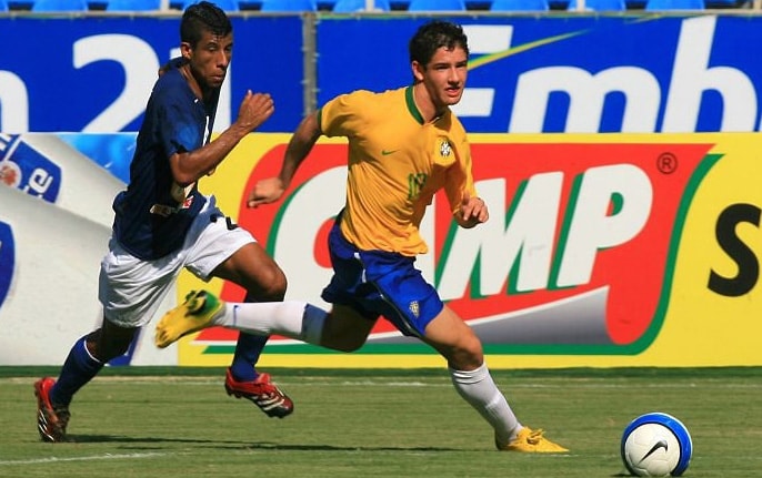 image of Brasil USA soccer player kicking soccer ball